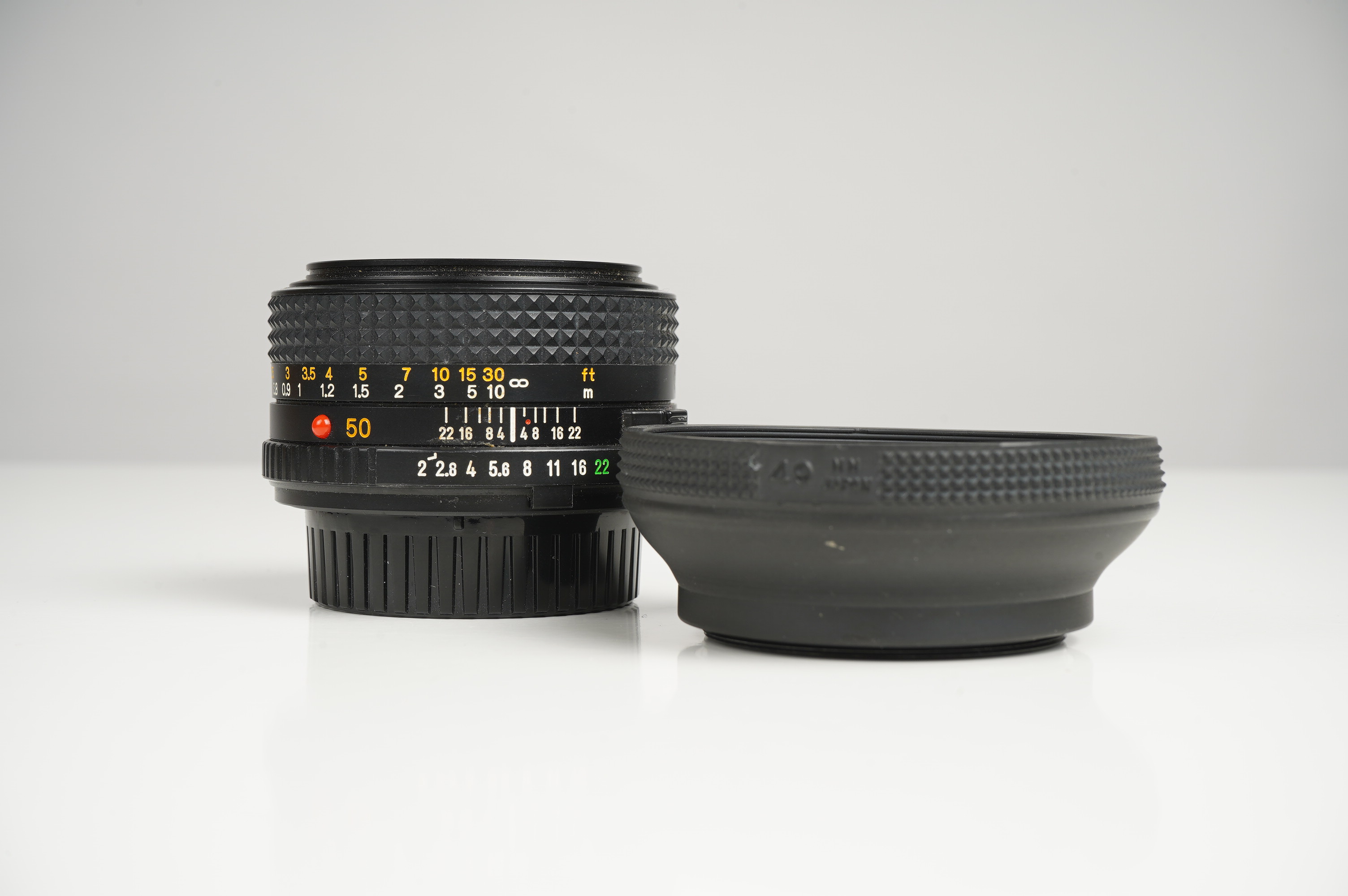 Gebraucht Minolta MD 50mm f2  | Gut erhalten - normale Gebrauchsspuren | inkl. Gegenlichtblende/Rückdeckel