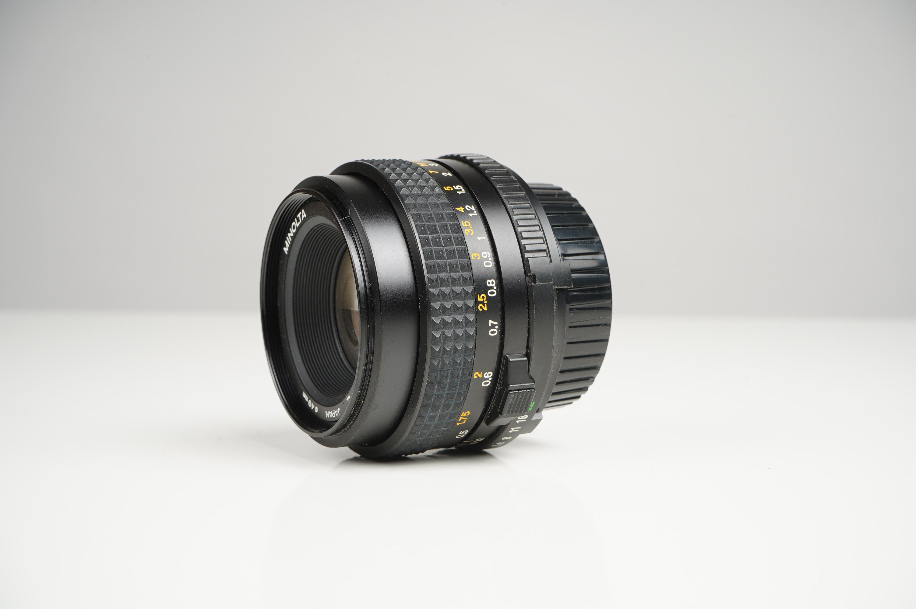Gebraucht Minolta MD 50mm f2  | Gut erhalten - normale Gebrauchsspuren | inkl. Gegenlichtblende/Rückdeckel