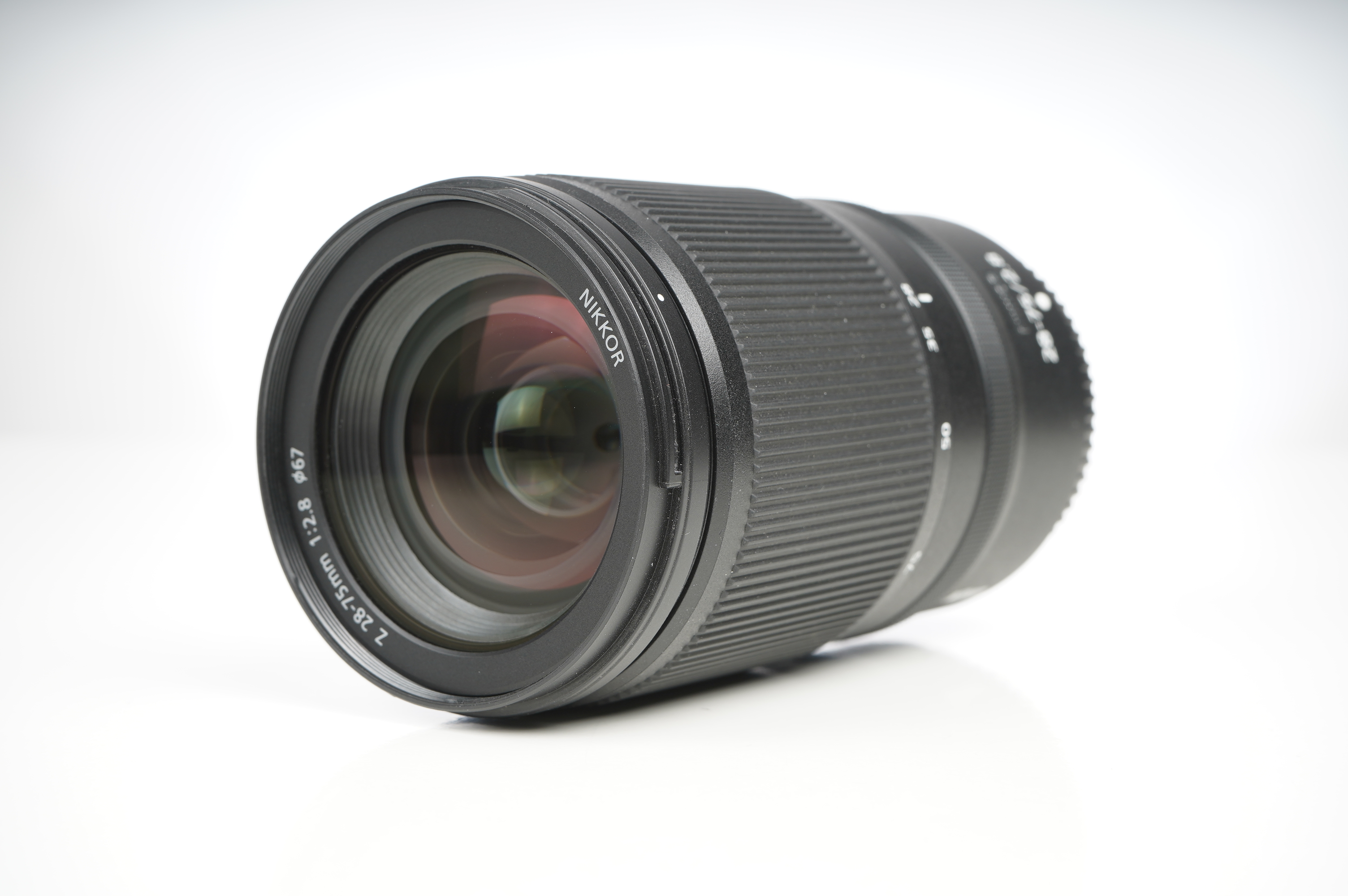 Gebraucht Nikon Z 28-75mm/2,8 | Ø67mm | neuwertig | inkl. Protector-Filter u HB-93a im Karton |