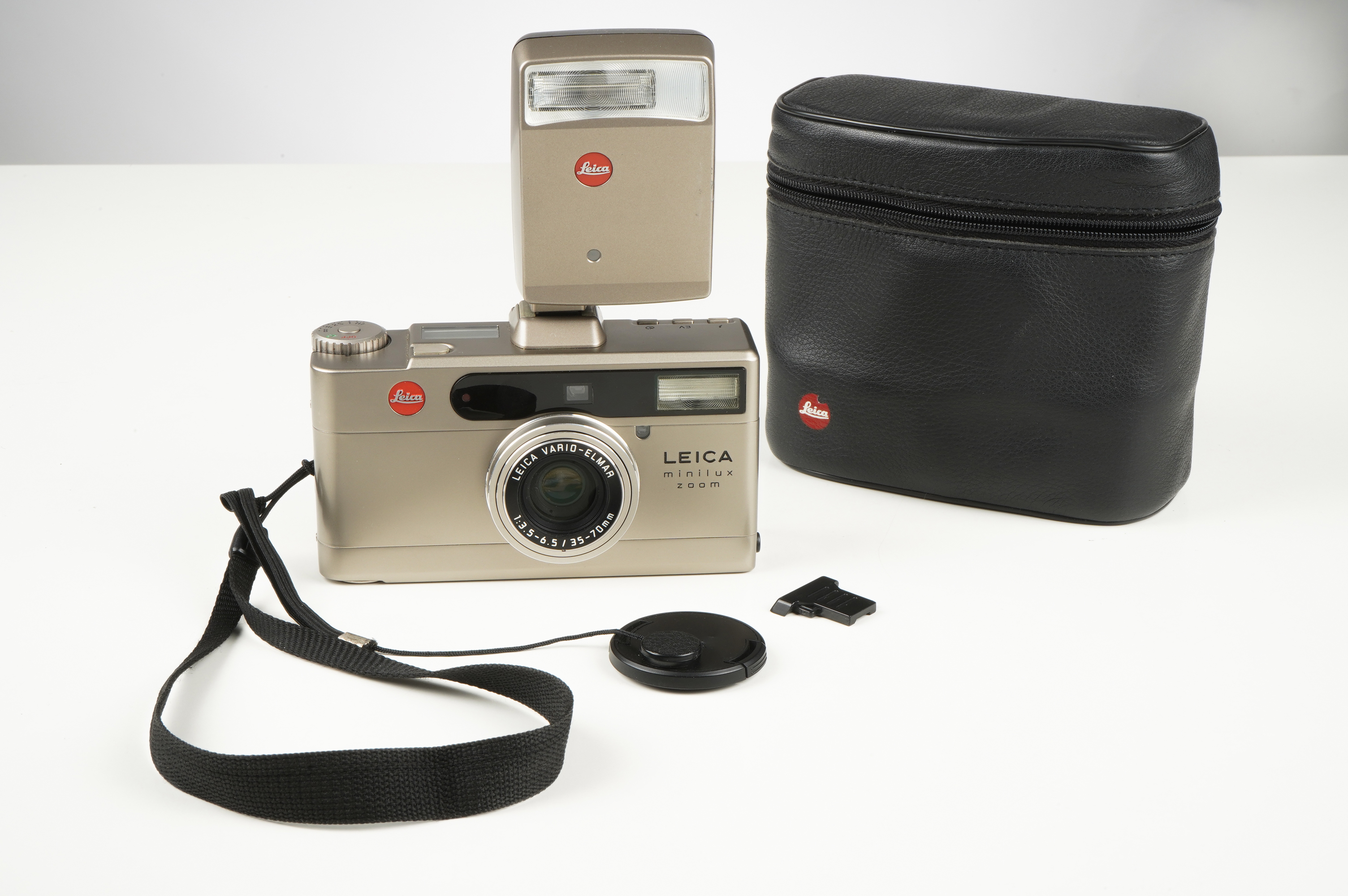 Gebraucht - Leica minilux Zoom  | leichte Gebrauchsspuren - voll funktionsfähig | inkl. Blitz Leica CF/Lederne Tasche/Handschlaufe/Deckel |