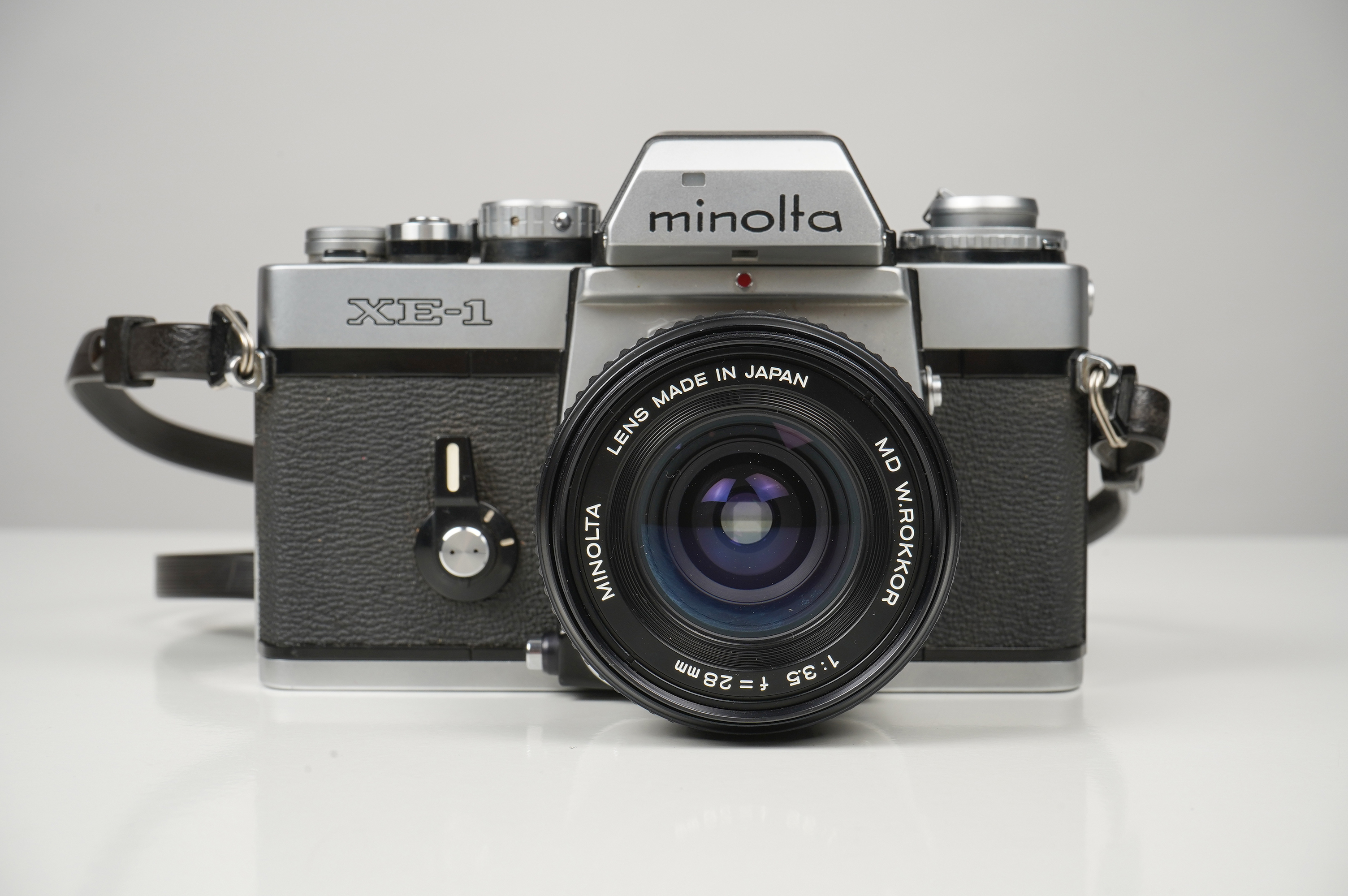 GebrauchtMinolta XE-1 Chrome + 28mm/3,5 MD  | Gut erhalten - normale Gebrauchsspuren | inkl. Riemen |