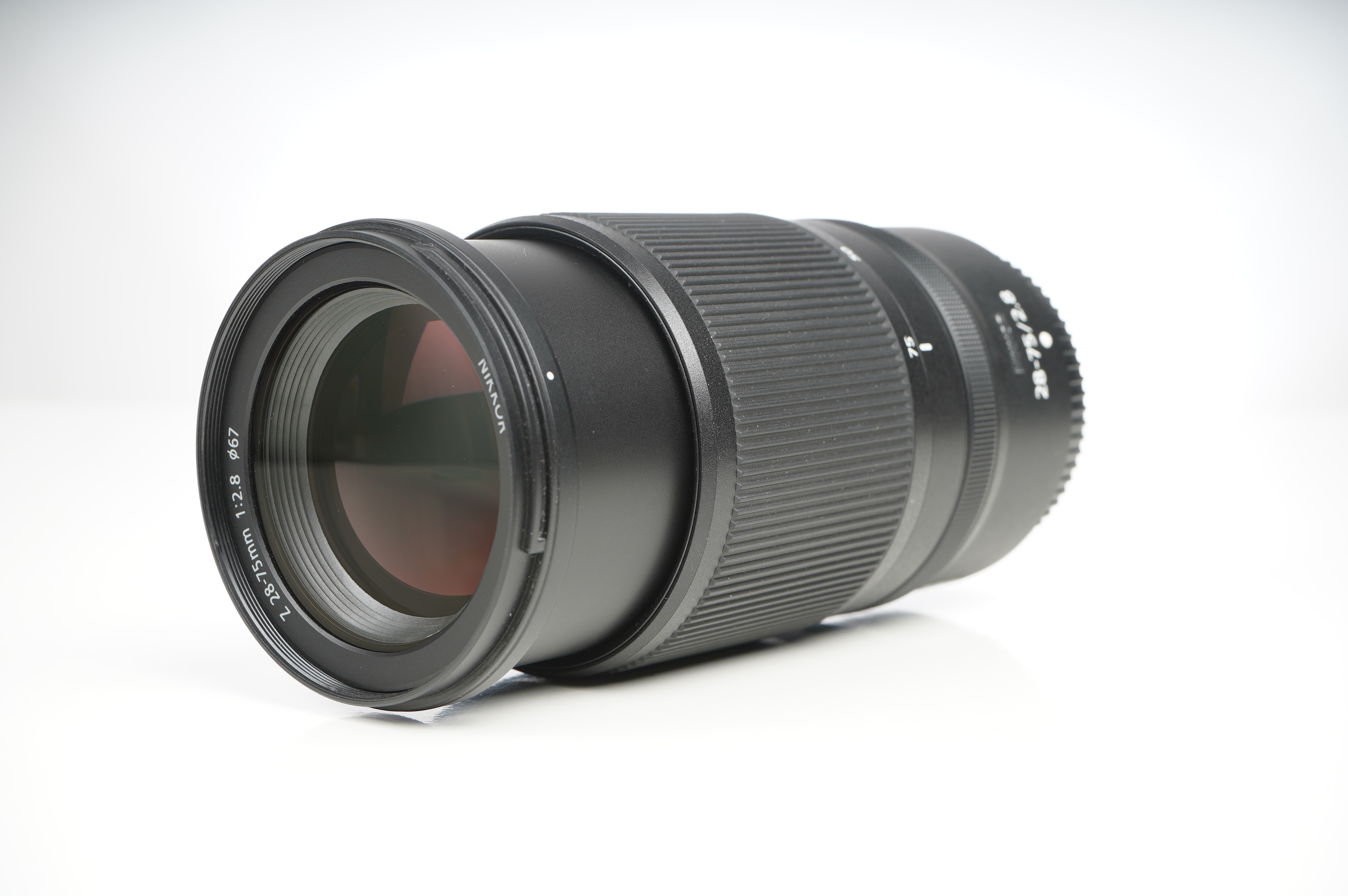 Gebraucht Nikon Z 28-75mm/2,8 | Ø67mm | neuwertig | inkl. Protector-Filter u HB-93a im Karton |
