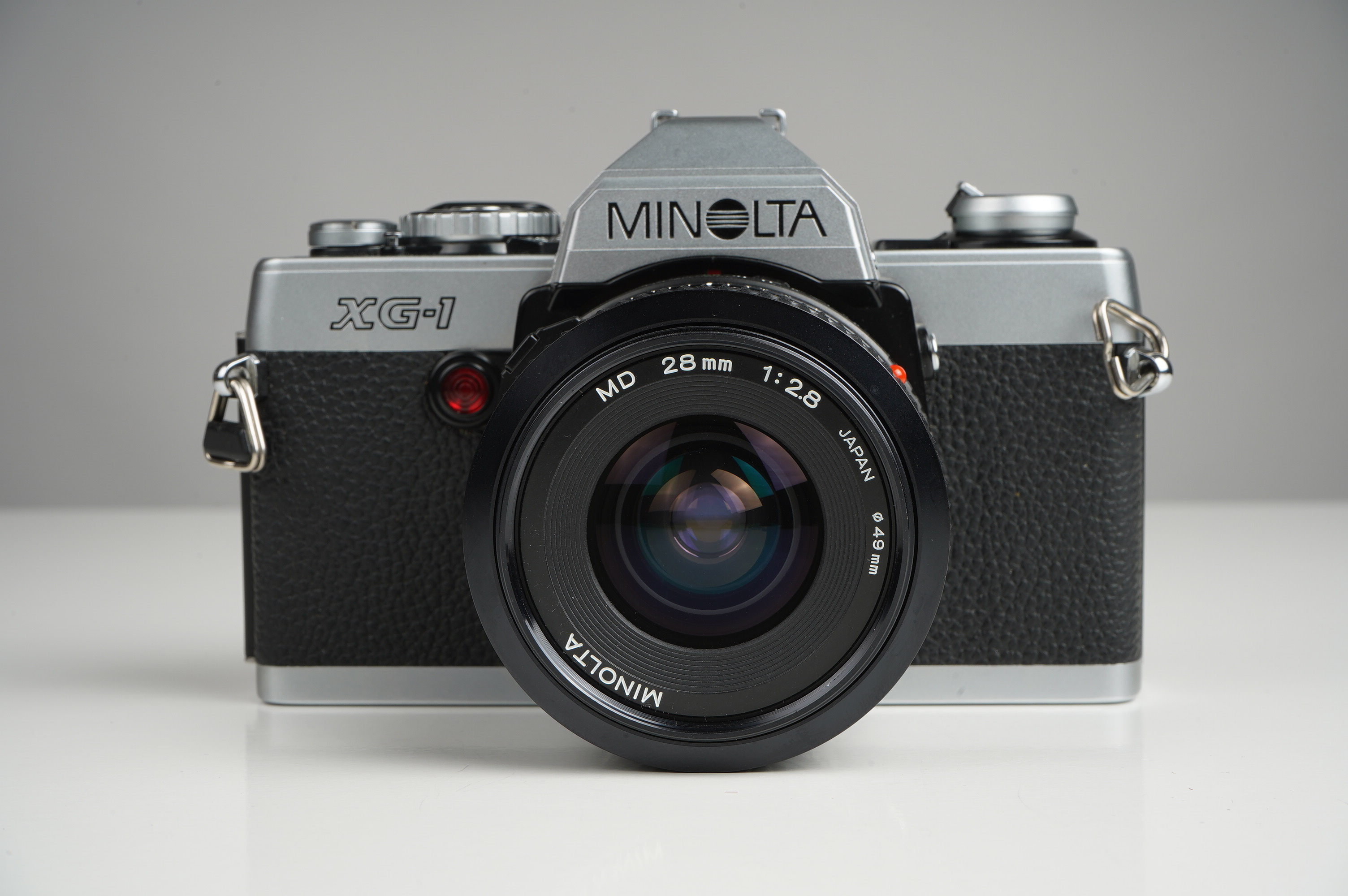 Gebraucht Minolta XG-1 + MD 28mm/2,8  | gut erhalten - kaum Gebrauchsspuren |